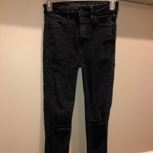 Super Stretch American Eagle black skinny jeans.